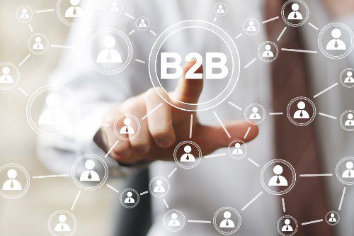 Person touching B2B network diagram.